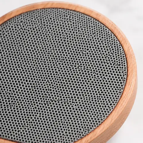 Round wooden Bluetooth speaker: Part close-up